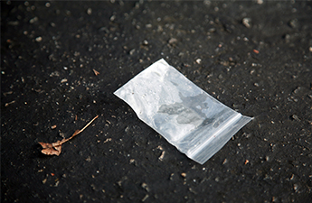 bag-of-crystal-meth-on-pavement