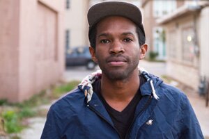 Close-up of man standing outside wondering about panic disorder hotline questions to ask